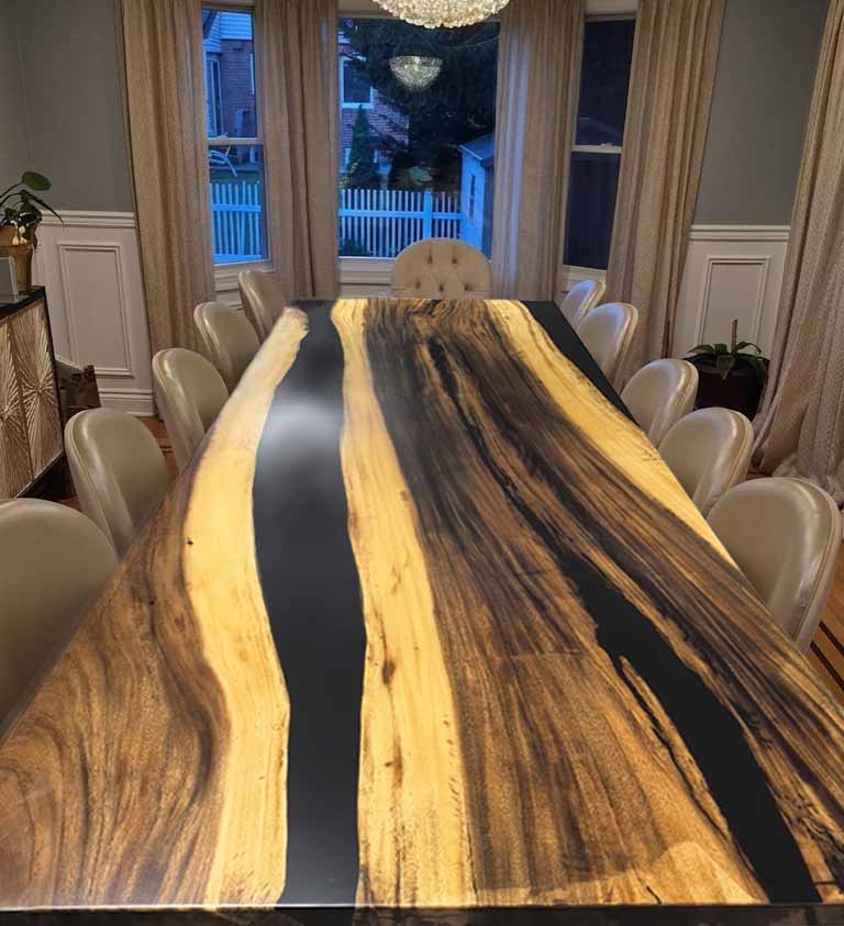 Big fancy natural wood with black resin dining table with family for Sabbath 12-14 seats