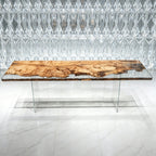One piece wood dining table made of Poplar tumors with clear epoxy