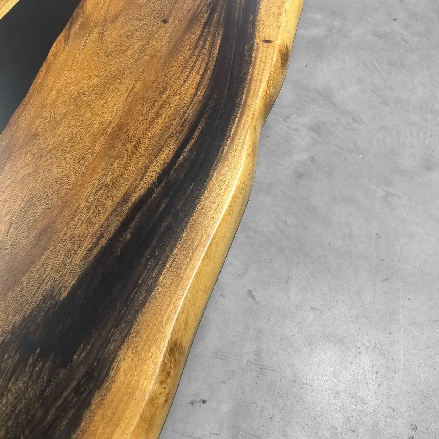 Hard wood dining table for 10 people with black river and live edge