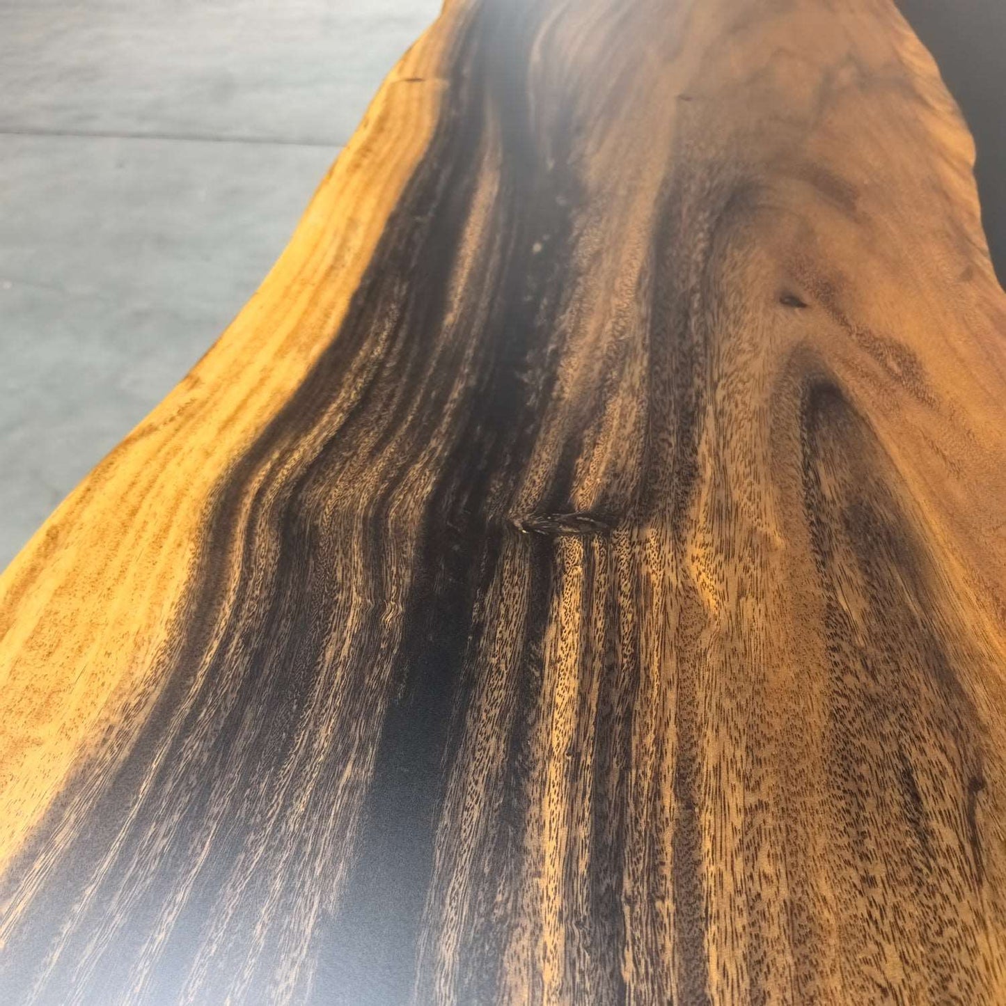 Hard wood dining table for 10 people with black river and live edge