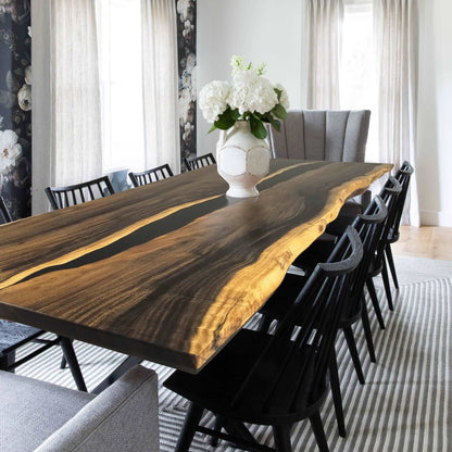 Hard wood dining table for 10 people with black river and live edge